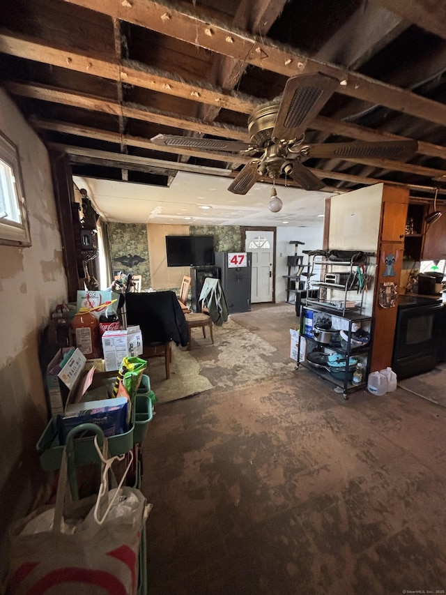 basement with ceiling fan