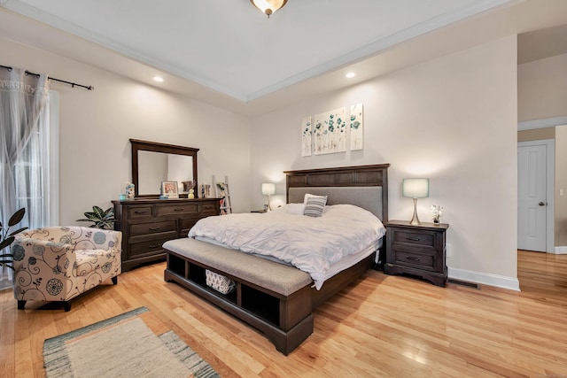 bedroom featuring recessed lighting, light wood-style flooring, and baseboards