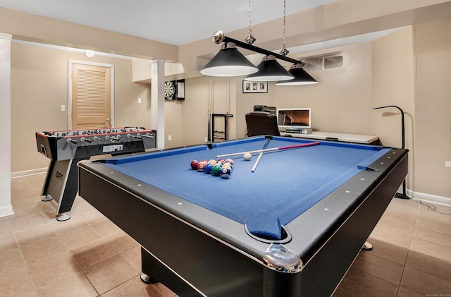 game room featuring tile patterned flooring and baseboards