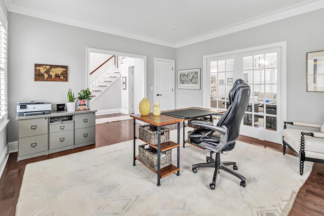 home office with crown molding, baseboards, and wood finished floors