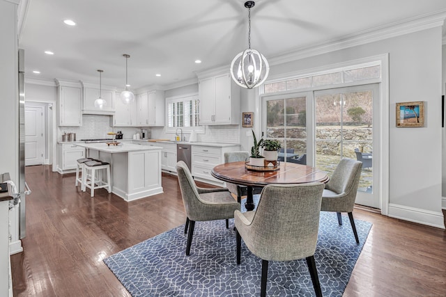 dining room with ornamental molding, recessed lighting, dark wood finished floors, and baseboards