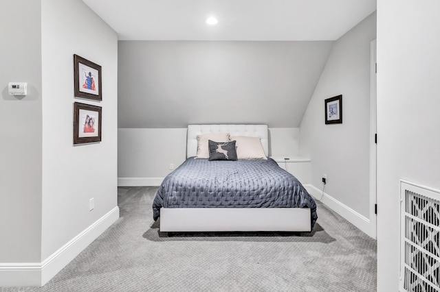 bedroom featuring recessed lighting, carpet flooring, vaulted ceiling, and baseboards