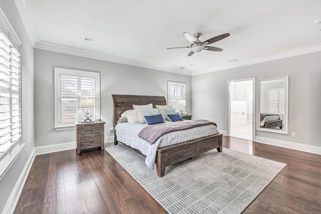 bedroom featuring ornamental molding, wood finished floors, connected bathroom, and baseboards