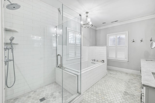 bathroom featuring a garden tub, ornamental molding, a stall shower, vanity, and baseboards