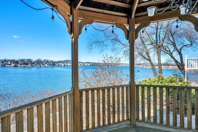 deck featuring a water view