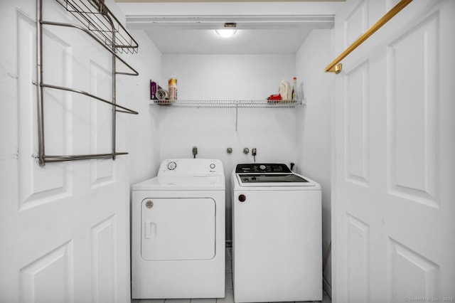 laundry area featuring laundry area and separate washer and dryer