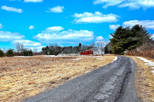 view of road featuring a rural view