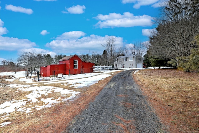 view of road with driveway