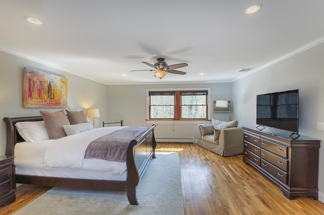 bedroom with recessed lighting, a baseboard heating unit, visible vents, light wood-style floors, and ornamental molding