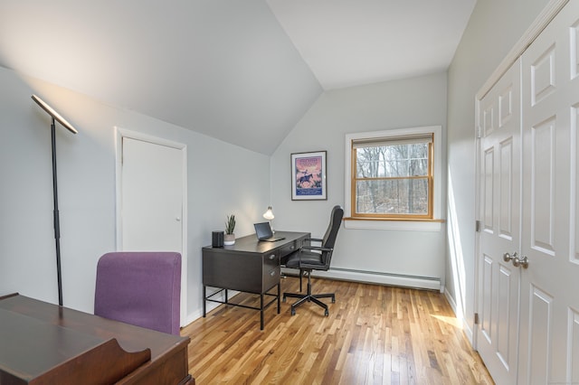 office with lofted ceiling, light wood-style floors, baseboards, and baseboard heating