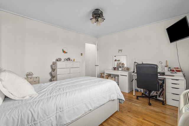 bedroom featuring light wood-style floors