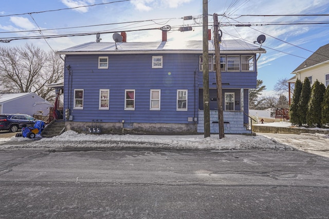 view of front of house with a chimney