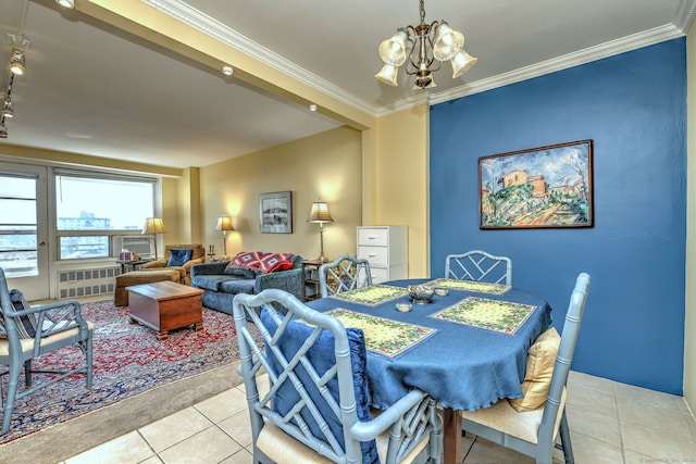 dining space with light tile patterned floors, a chandelier, and crown molding