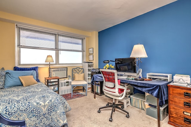 bedroom with a wall unit AC and carpet flooring