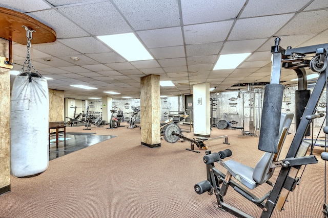 exercise room with a drop ceiling