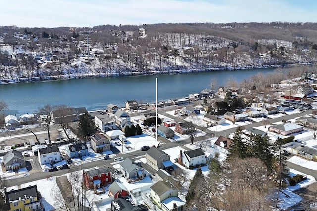 bird's eye view featuring a water view and a residential view