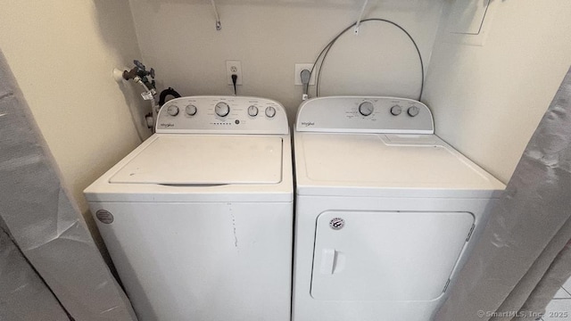 laundry area with laundry area and washer and dryer