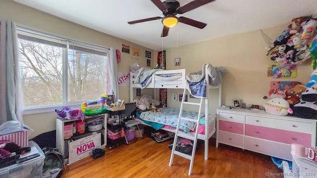 bedroom featuring ceiling fan and wood finished floors