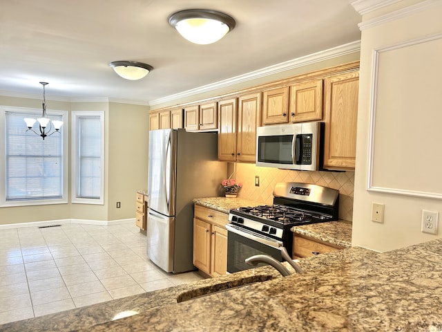 kitchen with a sink, backsplash, appliances with stainless steel finishes, crown molding, and light tile patterned floors