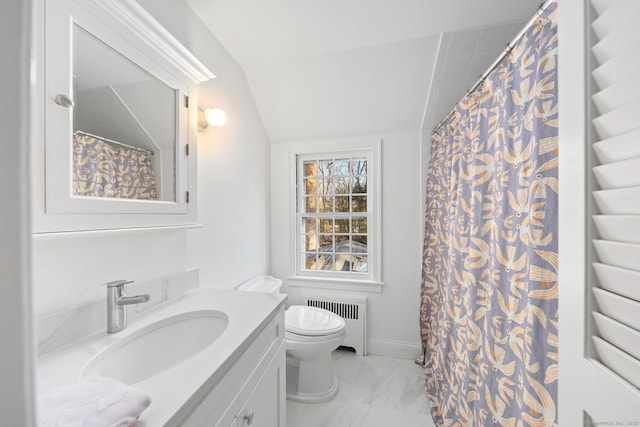 bathroom with lofted ceiling, toilet, radiator heating unit, marble finish floor, and vanity