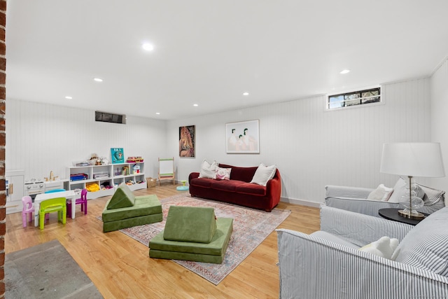 living room featuring recessed lighting and wood finished floors