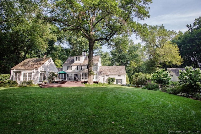 view of yard featuring a wooden deck