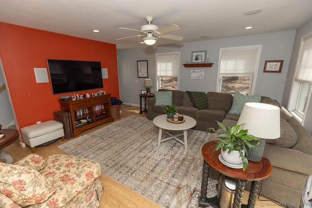 living room featuring a ceiling fan, wood finished floors, and recessed lighting