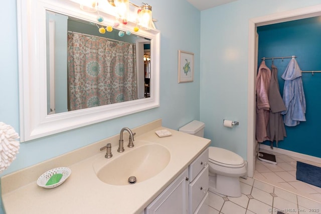 full bathroom with toilet, vanity, a shower with curtain, baseboards, and tile patterned floors