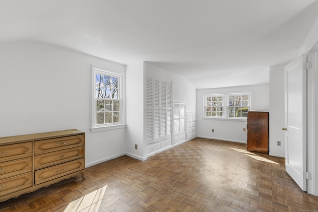 spare room featuring baseboards