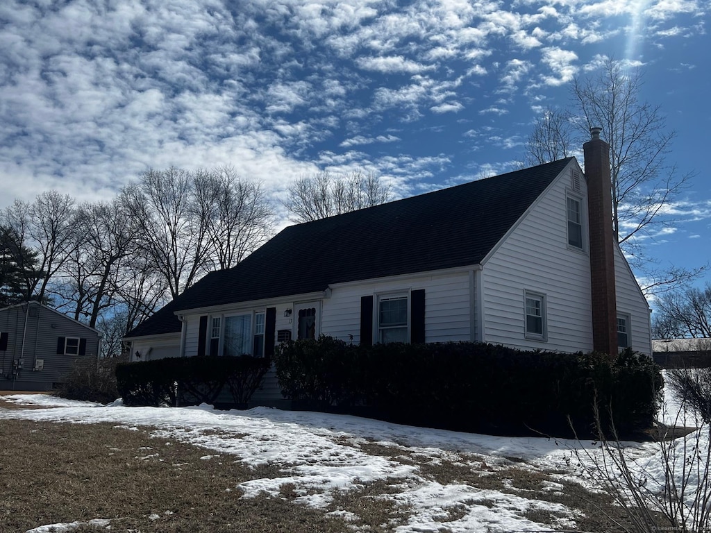 view of front of home with a chimney