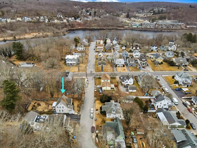 bird's eye view with a residential view and a water view