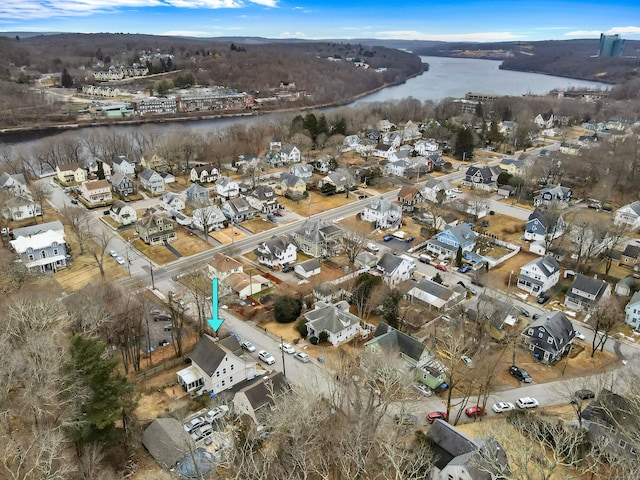 bird's eye view featuring a residential view and a water view