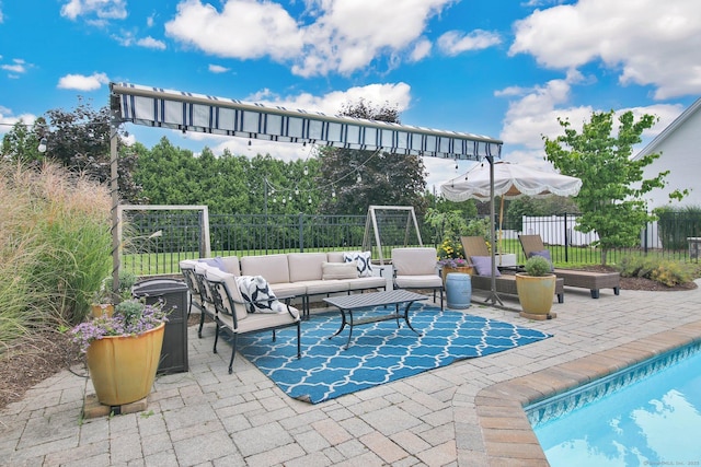 view of patio / terrace with a fenced backyard and outdoor lounge area