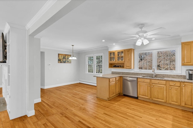 kitchen featuring dishwasher, light wood-style flooring, light stone counters, a baseboard heating unit, and a sink