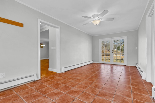 tiled spare room with a baseboard heating unit, french doors, a baseboard radiator, and ornamental molding