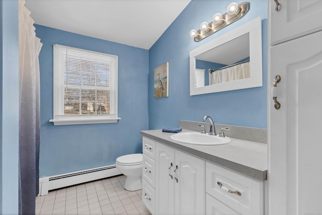 full bath featuring toilet, a baseboard radiator, tile patterned flooring, and vanity