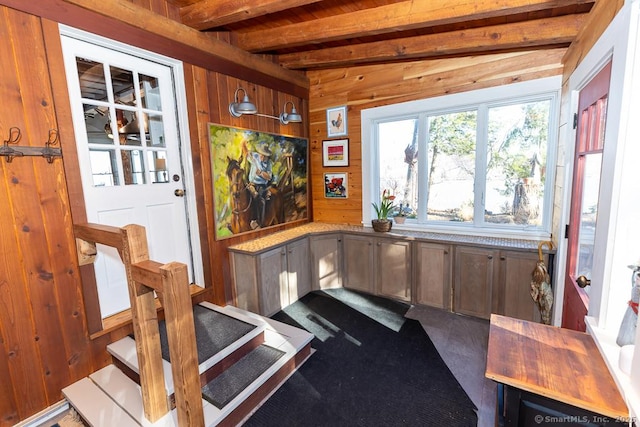 interior space featuring wood walls