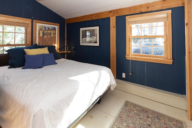 bedroom featuring vaulted ceiling