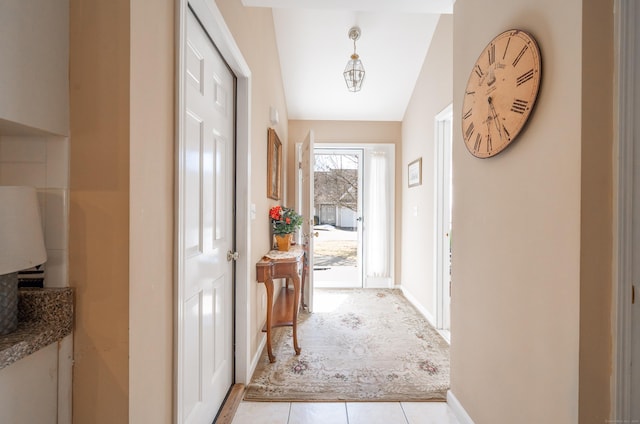 doorway with baseboards