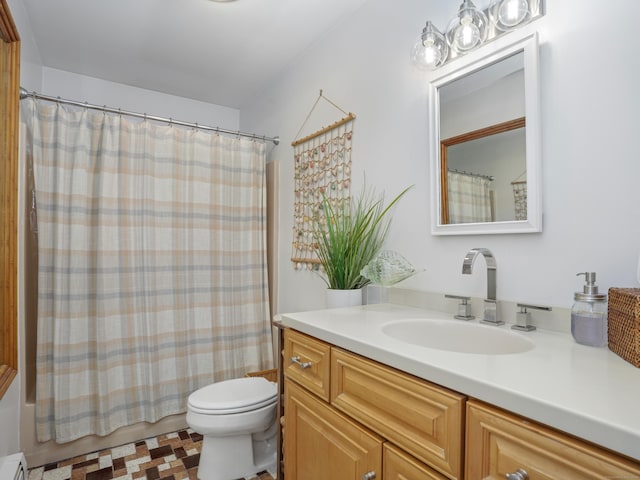 full bath featuring a baseboard radiator, shower / tub combo, toilet, and vanity