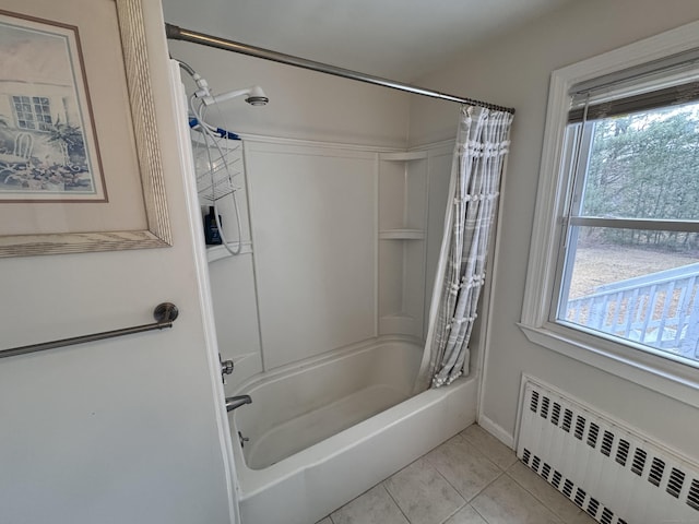 full bath featuring shower / bathtub combination with curtain, plenty of natural light, tile patterned floors, and radiator