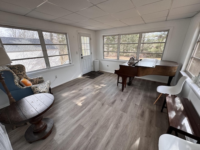 interior space featuring a drop ceiling