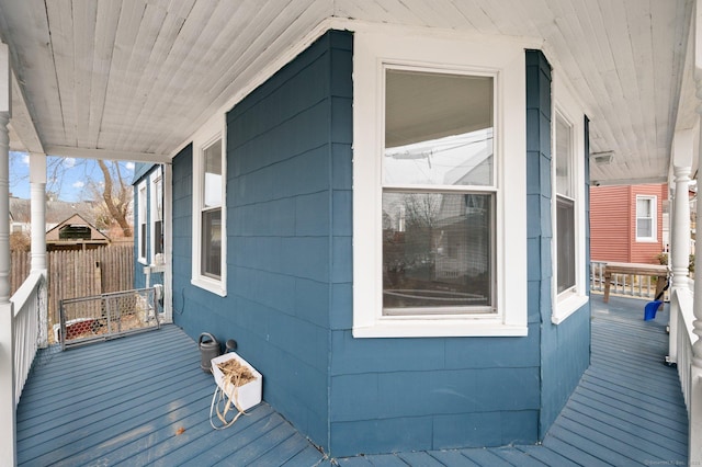 view of side of property featuring a porch