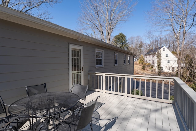 deck featuring outdoor dining area