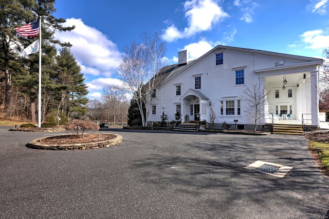 exterior space featuring a chimney