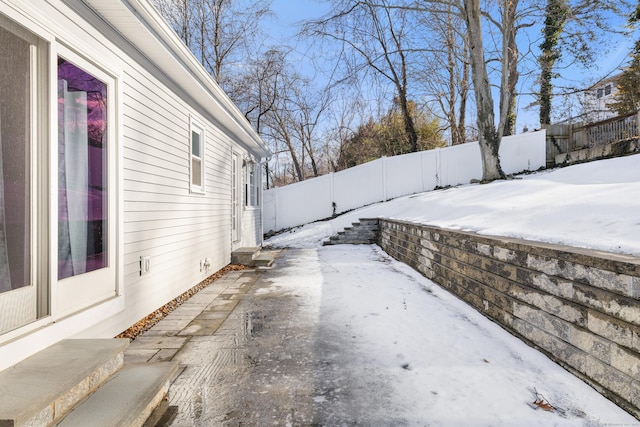 exterior space with a patio area and a fenced backyard