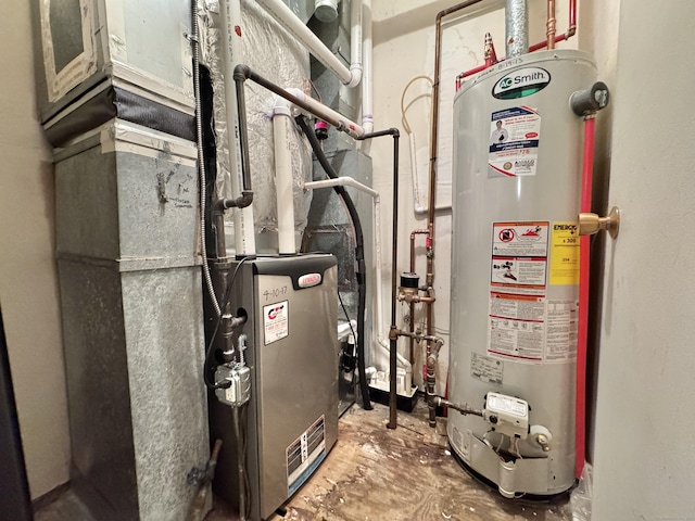 utility room with gas water heater