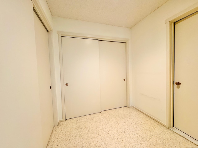 unfurnished bedroom featuring a closet