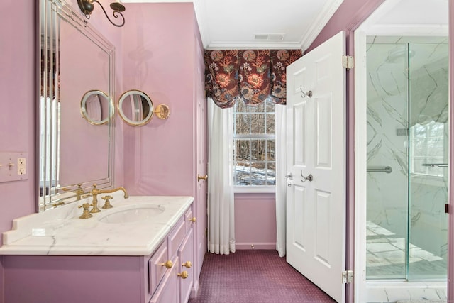 bathroom featuring a stall shower, baseboards, visible vents, ornamental molding, and vanity