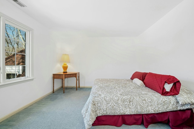 bedroom with carpet, visible vents, and baseboards